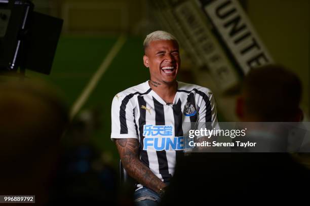 Newcastle's Kenedy laughs during a club interview after signing a new loan deal at the Newcastle United Training Centre on July 9 in Newcastle upon...