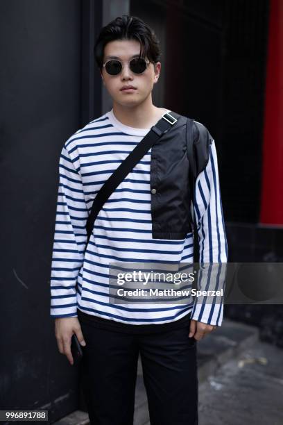 Alex Shibutani is seen on the street during Men's New York Fashion Week wearing Public School on July 11, 2018 in New York City.