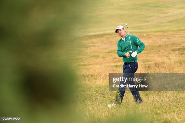 Justin Rose of England plays out of the deep rough on hole four during day one of the Aberdeen Standard Investments Scottish Open at Gullane Golf...