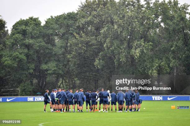 Team meeting during the training at the Schenkendorfplatz on July 12, 2018 in Berlin, Germany.