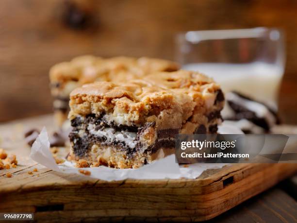 double chocolate, cookie stuffed brownies - brownie cake stock pictures, royalty-free photos & images