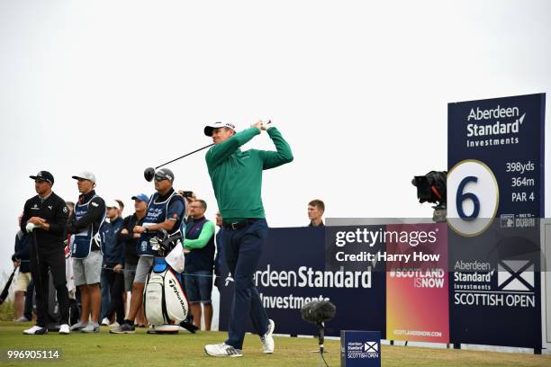 Justin Rose of England takes his tee shot on hole six during day one of the Aberdeen Standard Investments Scottish Open at Gullane Golf Course on...