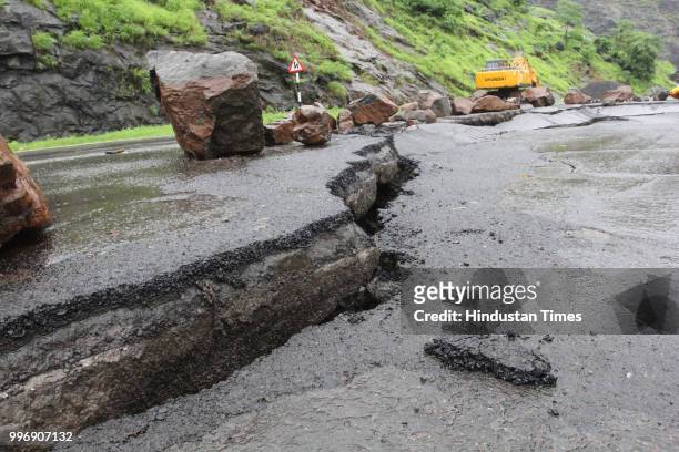 Cracks observed on newly repaired Mumbra by pass road, on July 11, 2018 in Mumbai, India. Constructed seven years ago to restrict heavy vehicles from...