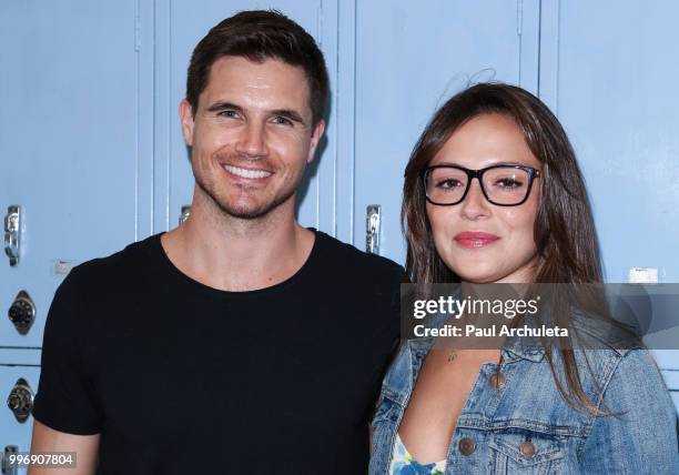 Actors Robbie Amell and Italia Ricci attend the screening of A24's "Eighth Grade" at Le Conte Middle School on July 11, 2018 in Los Angeles,...