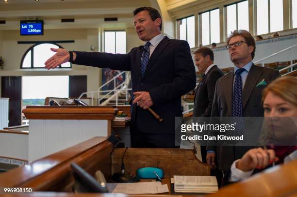 Tattersalls auctioneers during the 'Tattersalls' July Sale on July 11, 2018 in Newmarket, England. Founded in 1766 Tattersalls is Europes leading...