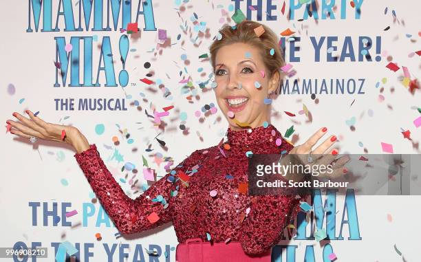 Catriona Rowntree throws confetti in the air as she attends the opening night of Mamma Mia! The Musical at Princess Theatre on July 12, 2018 in...
