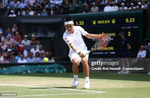 Kei Nishikori during his match against Novak Djokovic in their Men's Quarter Final match at All England Lawn Tennis and Croquet Club on July 11, 2018...