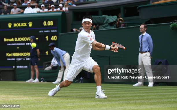 Kei Nishikori during his match against Novak Djokovic in their Men's Quarter Final match at All England Lawn Tennis and Croquet Club on July 11, 2018...