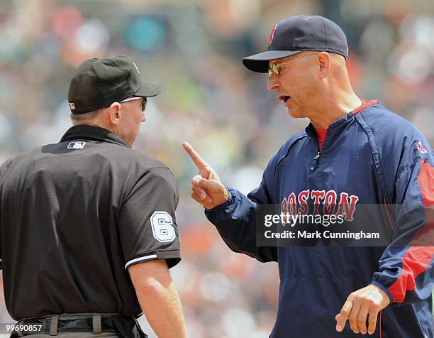 Manager Terry Francona of the Boston Red Sox argues his point with home plate umpire Lance Barksdale during the game against the Detroit Tigers at...