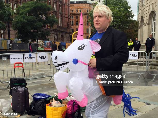 Boris Johnson impersonator Drew Galdron from London protesting against Brexit outside the Conservative party conference in Manchester, UK, 1 October...