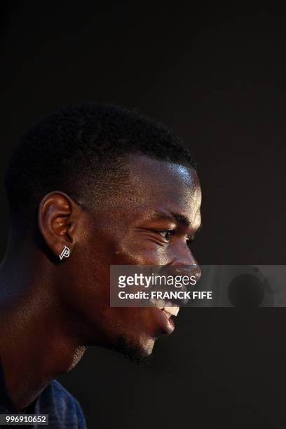 France's midfielder Paul Pogba attends a press conference at the press centre in Istra, west of Moscow, on July 12 ahead of their Russia 2018 World...