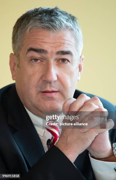 Deutsche Post board member Juergen Gerdes speaking during the presentation of the "PostBOT" robot for postal carriers in Bad Hersfeld, Germany, 4...