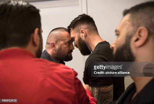 Boxing promoter Ahmet Oner and a member of Eubank Jr.'s staff face off at a press conference ahead of the World Boxing Super Series super...