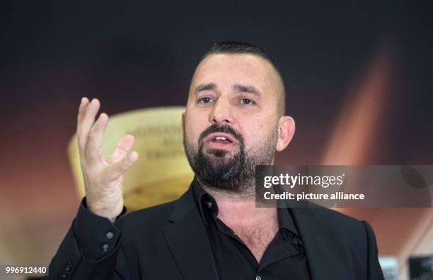 Boxing promoter Ahmet Oner gestures after the press conference ahead of the World Boxing Super Series super middleweight quarter final was broken...