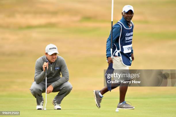 Richard Sterne of South Africa lines up a putt on hole sixteen during day one of the Aberdeen Standard Investments Scottish Open at Gullane Golf...