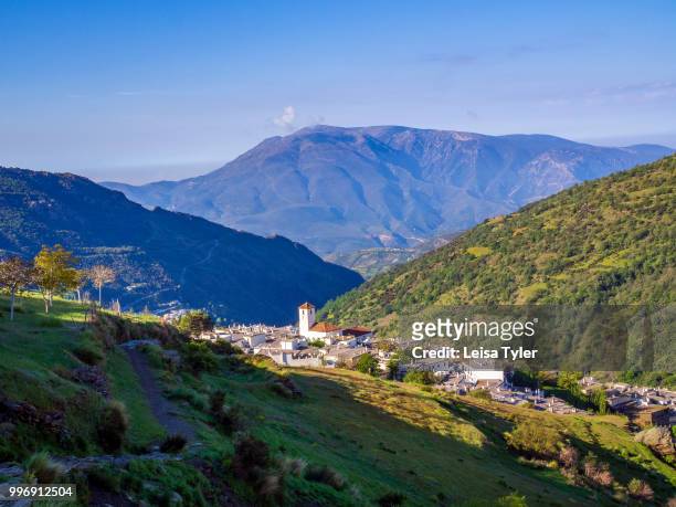 View over Capileira, the highest and most northerly village in the Poqueira river gorge, in the Alpujarra region in the Sierra Nevada, Andalusia,...