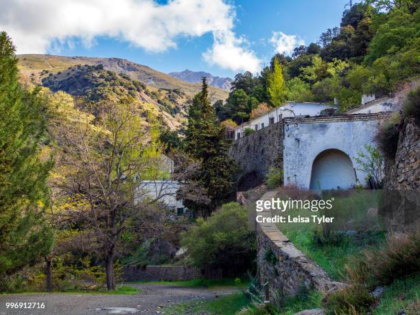 The abandoned village of La Cebadilla, built to house the workers on the hydro-electric installation at the upper end of the Poqueira Gorge in the...