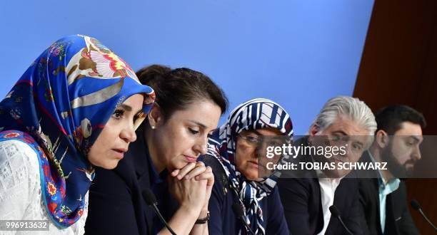 German lawyer Mehmet Daimagueler , lawyer Seda Basay and relatives of German National Socialist Underground neo-Nazi network's first alleged victim...