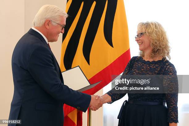 German President Frank-Walter Steinmeier presents the Order of Merit of the Federal Republic of Germany to Beate Alefeld-Gerges from Bremen, at...