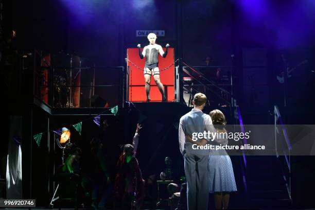 Musical actors perform on stage during the presentation of the new production of the 'Rocky Horror Show' in Cologne, Germany, 4 September 2017. The...