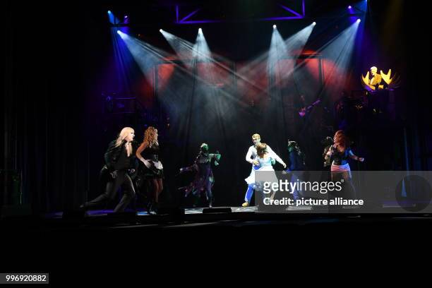 Musical actors perform on stage during the presentation of the new production of the 'Rocky Horror Show' in Cologne, Germany, 4 September 2017. The...