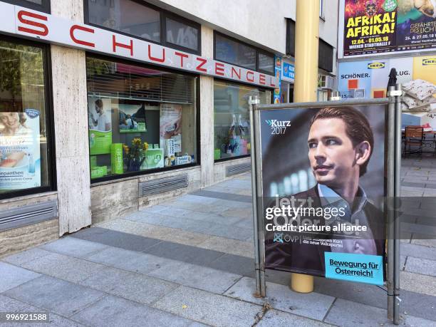 Campaign poster of the 'Liste Sebastian Kurz - die neue Volkspartei ' can be seen in front of a pharmacy called 'Schutzengel' in the workers'...