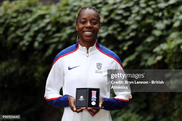 Lorraine Ugen of Great Britain poses with her medal at the Athletics World Cup Captains Medal Presentation on July 12, 2018 in London, England. The...