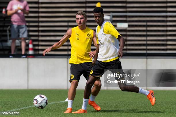 Maximilian Philipp of Dortmund and Alexander Isak of Dortmund battle for the ball during a training session at BVB trainings center on July 9, 2018...