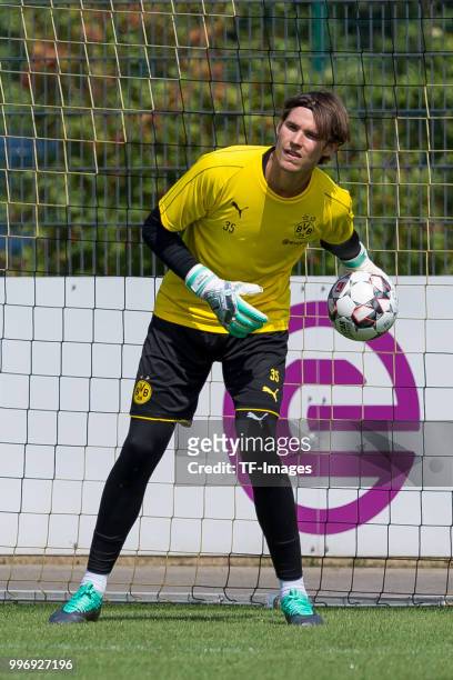 Goalkeeper Marwin Hitz of Dortmund controls the ball during a training session at BVB trainings center on July 9, 2018 in Dortmund, Germany.