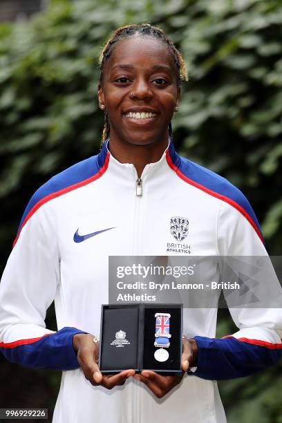 Lorraine Ugen of Great Britain poses with her medal at the Athletics World Cup Captains Medal Presentation on July 12, 2018 in London, England. The...