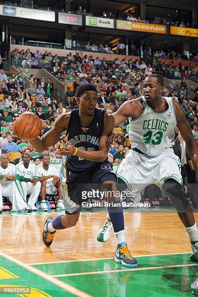 Rudy Gay of the Memphis Grizzlies drives the ball against Kendrick Perkins of the Memphis Grizzlies on March 10, 2010 at the TD Garden in Boston,...