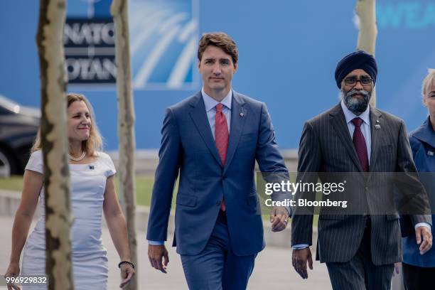 Chrystia Freeland, Canada's minister of foreign affairs, left, Justin Trudeau, Canada's prime minister, center, and Harjit Sajjan, Canadas defence...