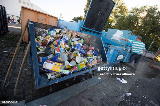 Empty food packaging lying at the recycling depot of the Cannstatt Volksfest in Stuttgart, Germany, 05 October 2017. About four to five tons of...