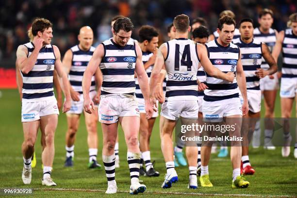 Patrick Dangerfield of the Cats and Joel Selwood of the Cats walk from the field at half time during the round 17 AFL match between the Adelaide...