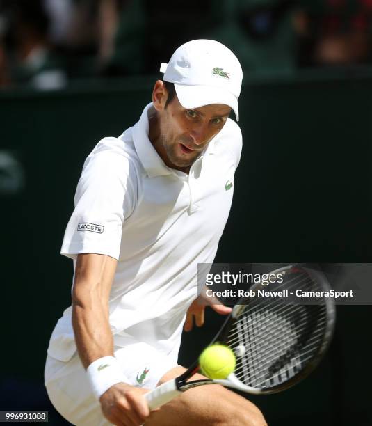 Novak Djokovic during his match against Kei Nishikori in their Men's Quarter Final match at All England Lawn Tennis and Croquet Club on July 11, 2018...