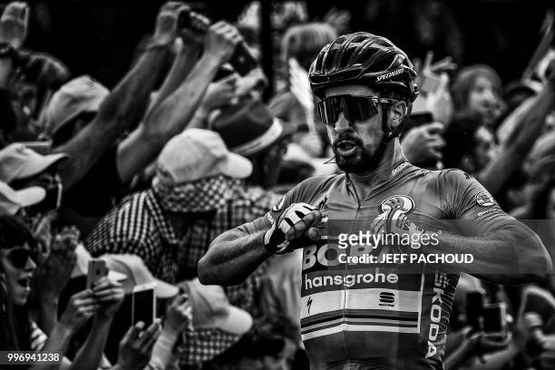 Slovakia's Peter Sagan celebrates as he crosses the finish line to win the fifth stage of the 105th edition of the Tour de France cycling race...