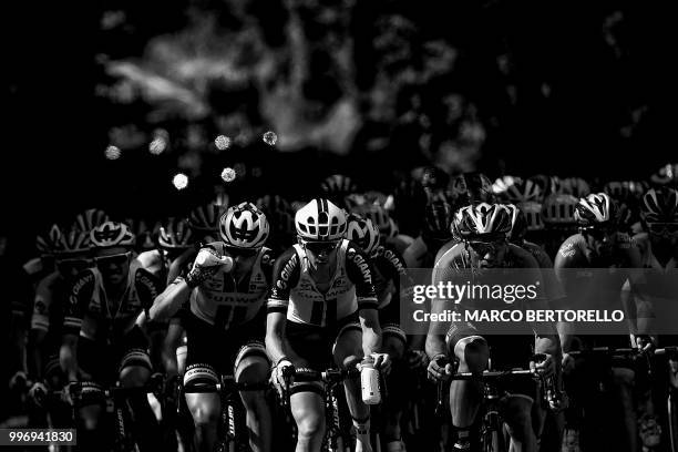 The pack rides during the fifth stage of the 105th edition of the Tour de France cycling race between Lorient and Quimper, western France, on July...