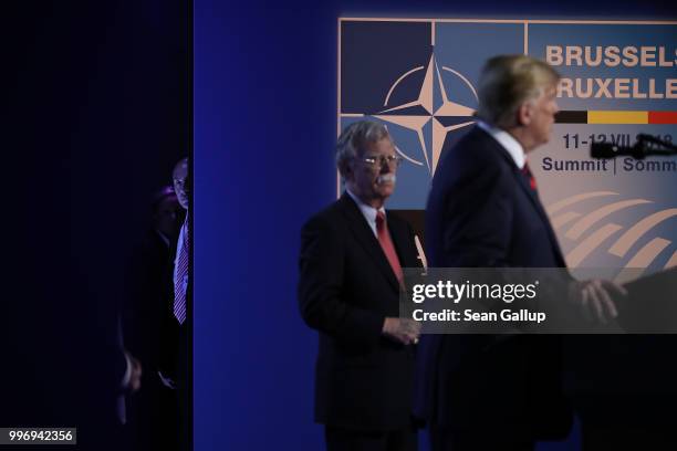 Stephen Miller , policy advisor to U.S. President Donald Trump, looks on as Trump, flanked by National Security Advisor John Bolton, speaks to the...