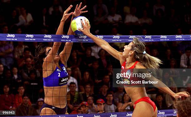 Lisa Arce of USA and Lucilla Perrotta of Brazil in action during the McPeak/Arce of USA v Gattelli/Perrotta of Italy Beach Volleyball match held at...