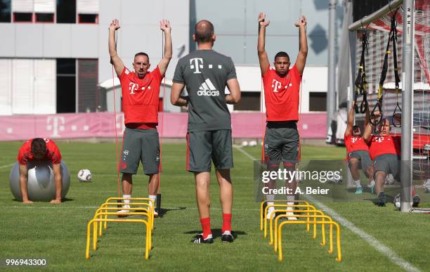 Javi Martinez, Franck Ribery, Serge Gnabry, Juan Bernat and Arjen Robben of FC Bayern Muenchen practice during a training session at the club's...