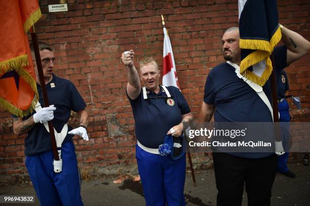 Female band member gives last minute instructions as the annual 12th of July Orange march and demonstration takes place on July 12, 2018 in Belfast,...