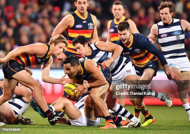 Eddie Betts of the Crows runs with the ball during the round 17 AFL match between the Adelaide Crows and the Geelong Cats at Adelaide Oval on July...