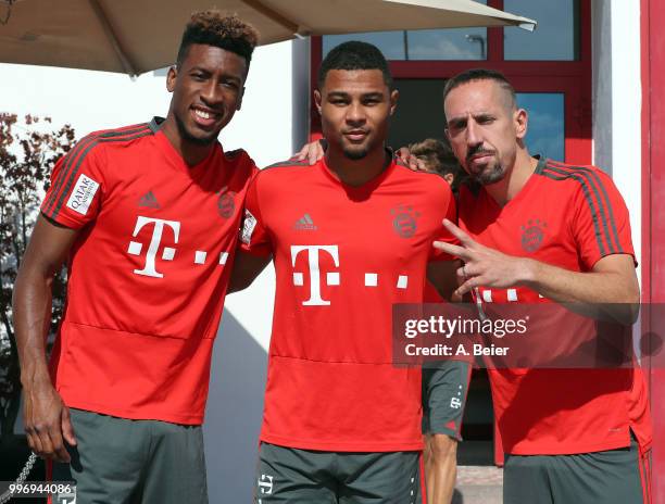 Kingsley Coman, Serge Gnabry and Franck Ribery of FC Bayern Muenchen pose before a training session at the club's Saebener Strasse training ground on...