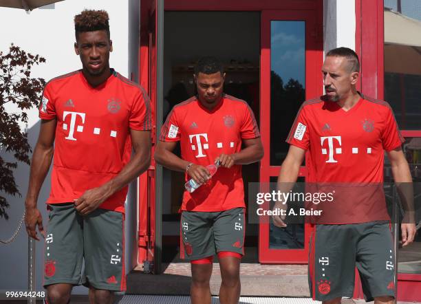 Kingsley Coman, Serge Gnabry and Franck Ribery of FC Bayern Muenchen arrive for a training session at the club's Saebener Strasse training ground on...