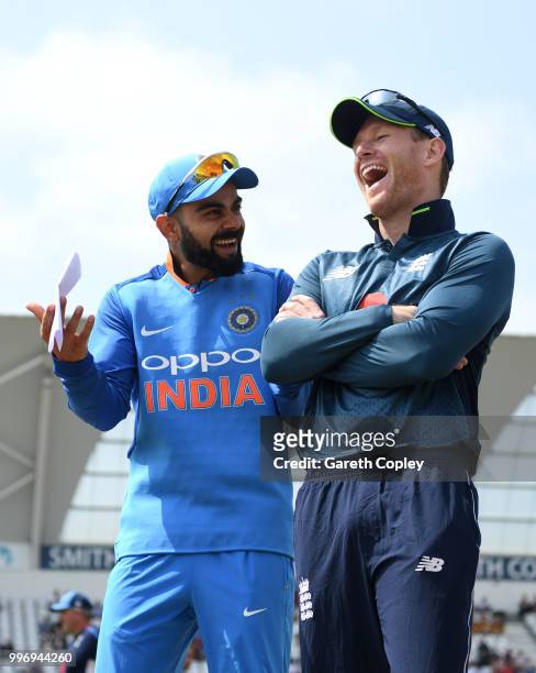 England captain Eoin Morgan shares a joke with India captain Virat Kohli ahead of the Royal London One-Day match between England and India at Trent...