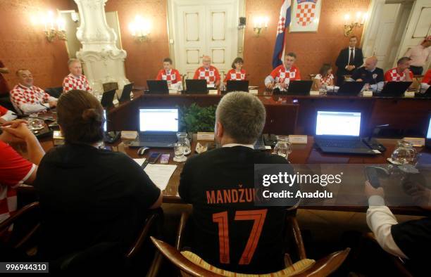 Prime Minister of Croatia Andrej Plenkovic and ministers in the cabinet attend a meeting in soccer team jerseys to mark Croatia National Football...