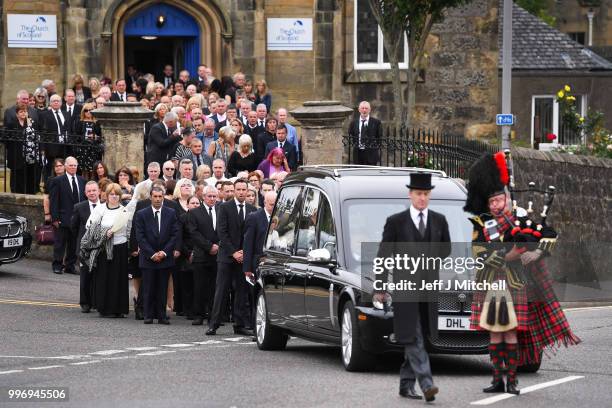 Mourners attend the funeral of Bay City Roller guitarist Alan Longmuir attends his funeral at Allan Church on July 12, 2018 in Bannockburn, Scotland....