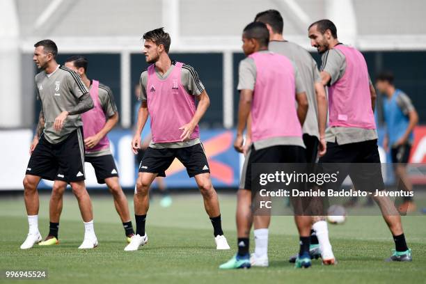 Federico Bernardeschi and Daniele Rugani during a Juventus training session at Juventus Training Center on July 12, 2018 in Turin, Italy.