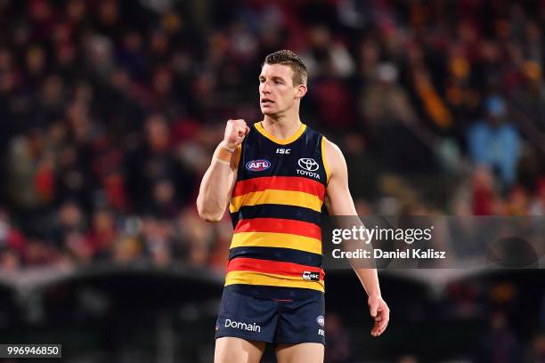 Josh Jenkins of the Crows celebrates after kicking a goal during the round 17 AFL match between the Adelaide Crows and the Geelong Cats at Adelaide...