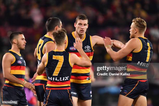 Josh Jenkins of the Crows celebrates after kicking a goal during the round 17 AFL match between the Adelaide Crows and the Geelong Cats at Adelaide...